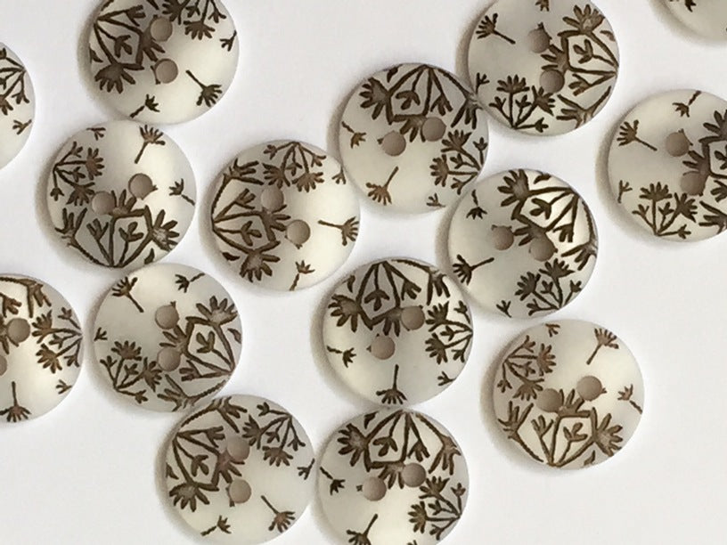 Opaque White Polyester Buttons with Black Seed Head Design 12mm- TGB2356
